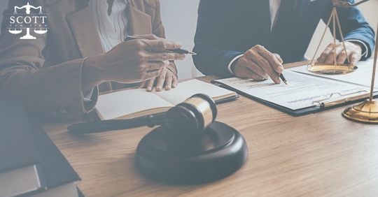 lawyers discussing at a table