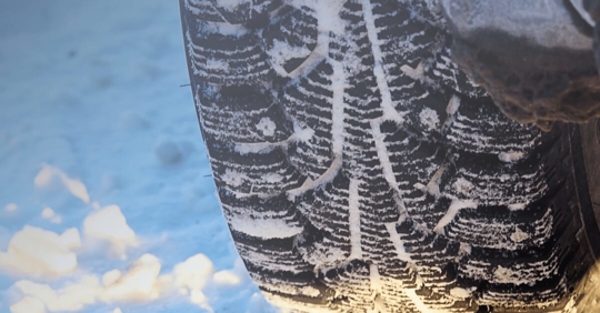 tire with snow between the tread