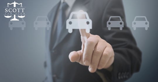 adjuster touching vehicle photo