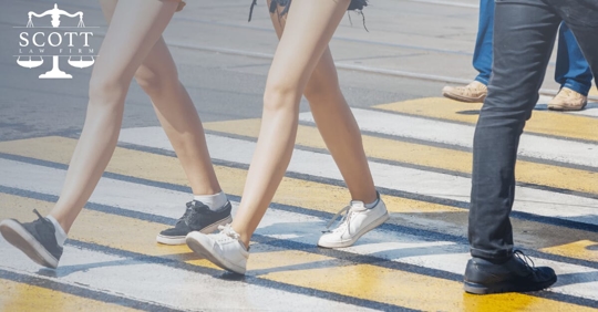 pedestrians crossing the street