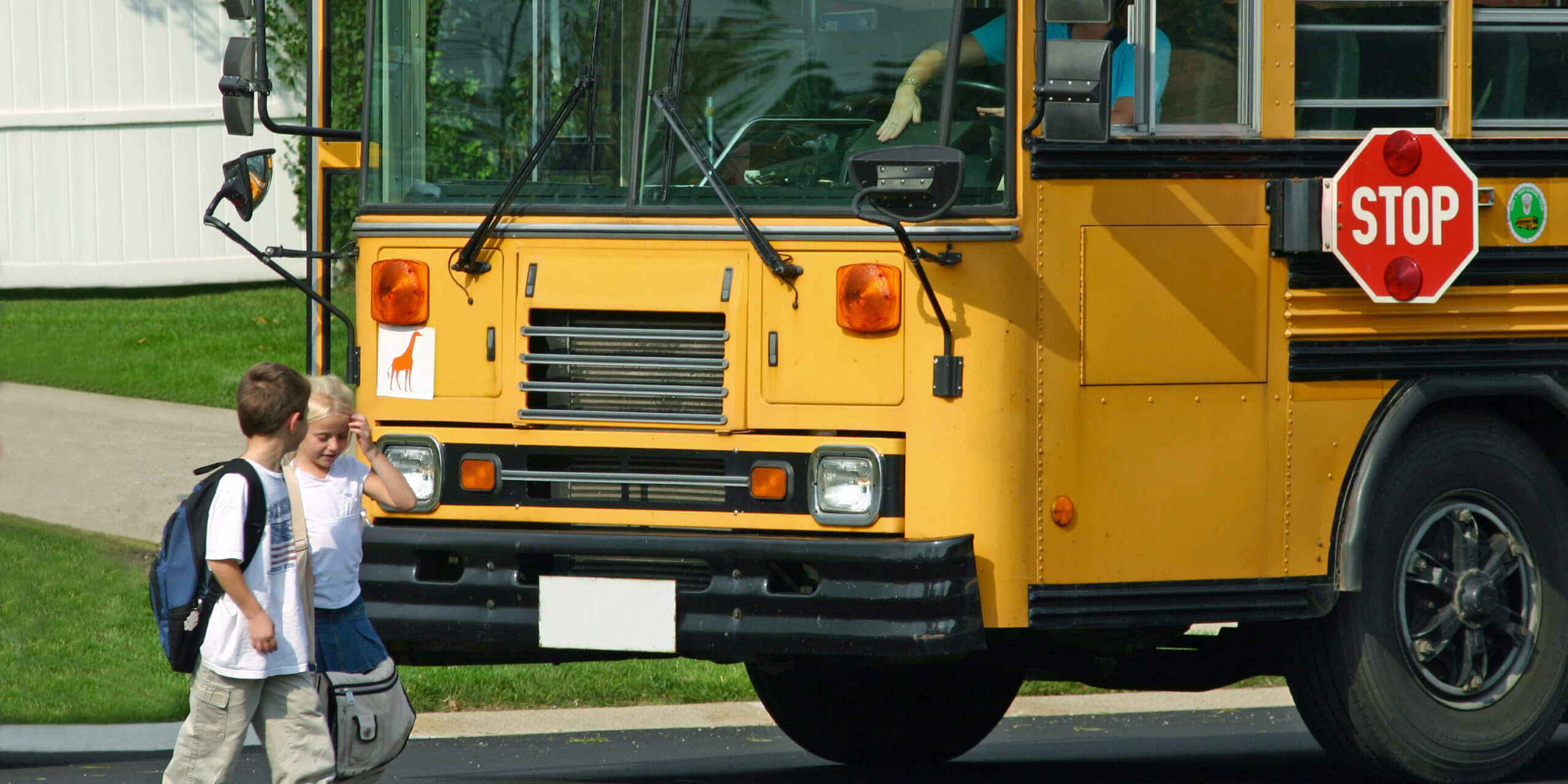 Crossing In Front Of School Bus